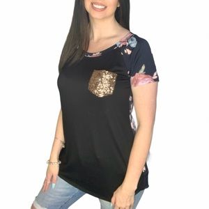 New black top with floral sleeves & back w/ pocket
